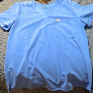 Figs scrub one pocket top. Ceil blue, pair it with the ceil blue pants for sale!